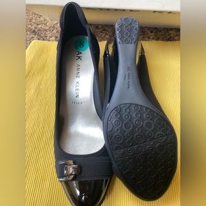 Anne Klein black wedge heels shoes.  Never worn.  Brought the wrong size.